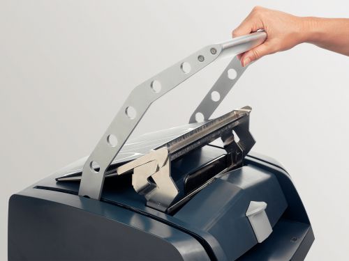 The de-binder re-opens the metal channel to remove or to add paper sheets to the document.