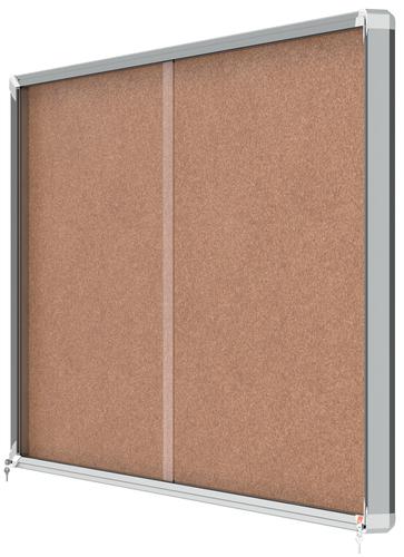 54877AC | Cork lockable notice board with sliding glass doors and unobtrusive integrated corner lock. Complete with a modern stylish aluminum trim and fixed with a rail and through corner wall mounting. Excellent cork notice board surface to securely pin and display your notices. Size: 27xA4 sheets.
