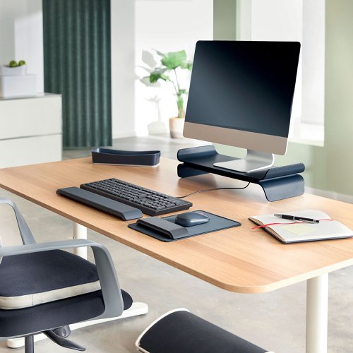 21804AC | The Leitz Ergo Adjustable Computer Monitor Stand helps create a comfortable and ergonomic workspace by raising your monitor to an optimal viewing height. Designed to provide maximum comfort while sitting or standing, this monitor riser promotes a healthy posture and optimises comfort for the neck and shoulders. The adjustable desk monitor stand has 2 height settings and will securely hold up to 27" monitor screens. There is also space underneath the desk riser to store a keyboard or other daily essentials to keep desks and work surfaces clutter free. With it's minimalist design and matt finish, this stylish monitor stand for desks can have a positive impact on wellbeing by effortlessly creating the perfect active working set-up. Combine with other Leitz Ergo products for an inviting and flexible workspace to help you stay active and productive throughout the day.