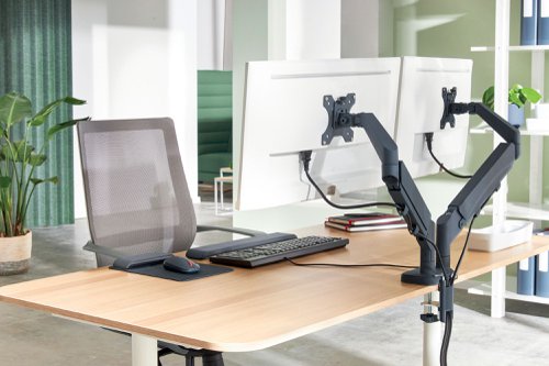 21818AC | The Leitz Space Saving Dual Monitor Arm has a positive impact on posture, promotes proper eye alignment and supports neck and shoulder comfort when the height of the monitors are adjusted correctly, and as recommended, to the ideal ergonomic position. The monitor stand remains stable at all heights and angles and can be easily switched between landscape and portrait mode. It's design is ideal for where space is limited and it will free up valuable desktop space. Ergonomically designed to promote wellness and increase productivity.