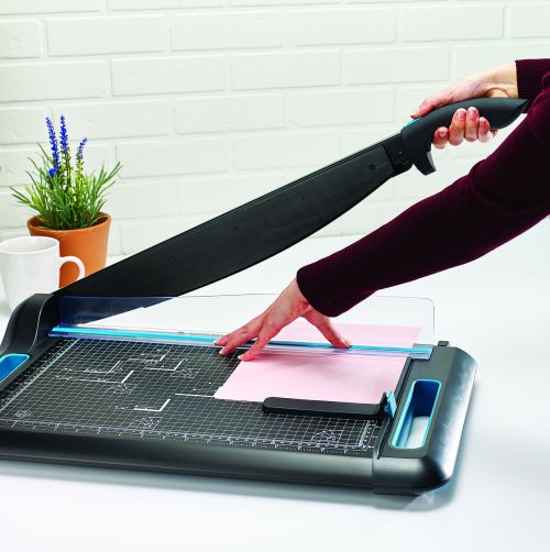 The Avery A2 office guillotine is designed to be more compact and sturdier than other guillotines. Carry handles direct where the user should pick the guillotine and also keeps hands away from the blade with colourful touch points for style and comfort.With improved safety features, this A2 office guillotine has a self-sharpening blade and the safety guard does not restrict any movement by the user but maximises visibility. This guillotine includes a backstop which is adjustable and lockable which ensures the paper is placed in the same location when volume cutting and features a clippings tray to collect all the off cuts.With an updated grid layout on the baseboard,  it shows all photographic and paper templates and also shows imperial and metric measurements.