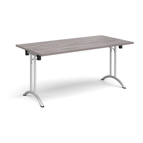Rectangular folding leg table with silver legs and curved foot rails 1600mm x 800mm - grey oak