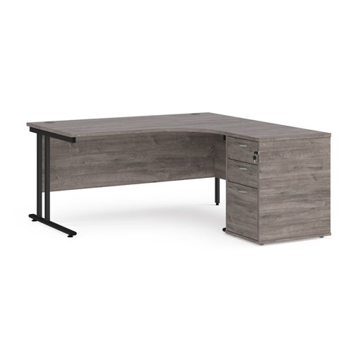 Maestro 25 right hand ergonomic desk 1600mm with black cantilever frame and desk high pedestal - grey oak