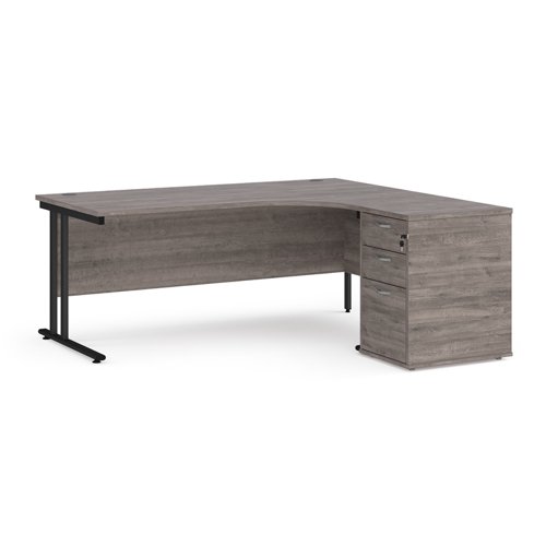 Maestro 25 right hand ergonomic desk 1800mm with black cantilever frame and desk high pedestal - grey oak