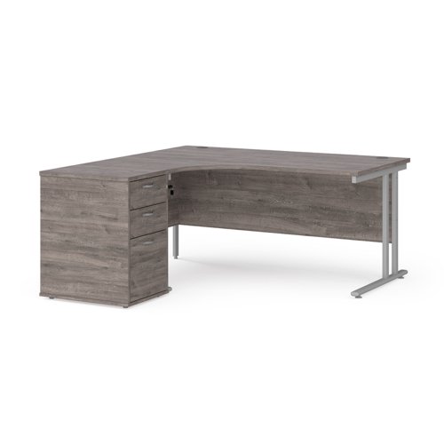 Maestro 25 left hand ergonomic desk 1600mm with silver cantilever frame and desk high pedestal - grey oak EBS16LGO Buy online at Office 5Star or contact us Tel 01594 810081 for assistance