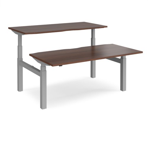 Elev8 Touch sit-stand back-to-back desks 1600mm x 1650mm - silver frame, walnut top