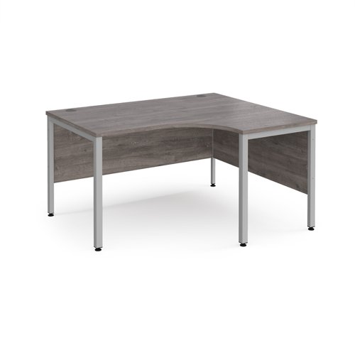 Maestro 25 Right Hand Ergonomic Desk 1400mm Wide Silver Bench Leg Frame Grey Oak Top