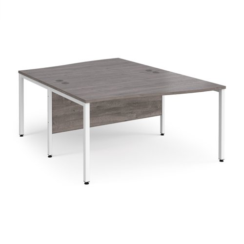 Maestro 25 Back To Back Wave Desks 1400mm Deep White Bench Leg Frame Grey Oak Top