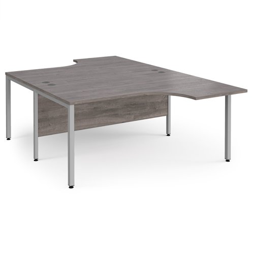 Maestro 25 back to back ergonomic desks 1600mm deep - silver bench leg frame, grey oak top