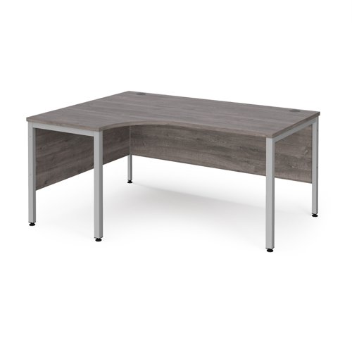 Maestro 25 Left Hand Ergonomic Desk 1600mm Wide Silver Bench Leg Frame Grey Oak Top