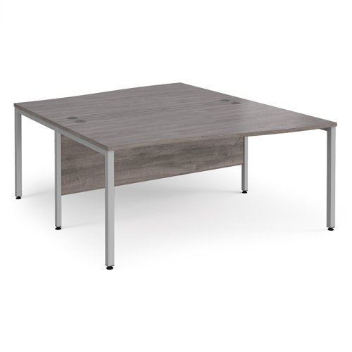 Maestro 25 Back To Back Wave Desks 1600mm Deep Silver Bench Leg Frame Grey Oak Top