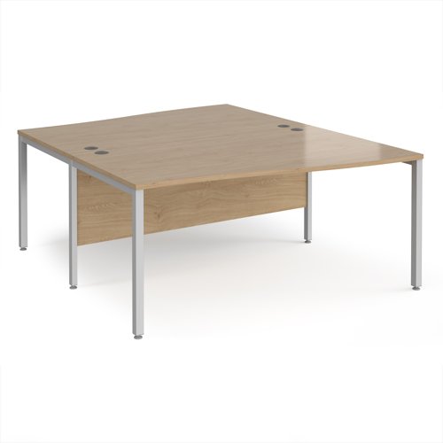 Maestro 25 back to back wave desks 1600mm deep - silver bench leg frame, Kendal Oak top