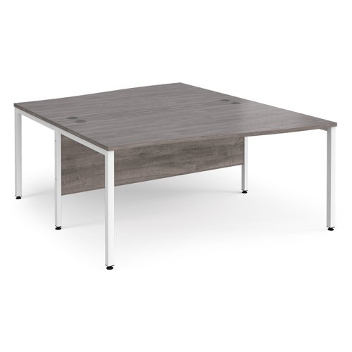 Maestro 25 Back To Back Wave Desks 1600mm Deep White Bench Leg Frame Grey Oak Top