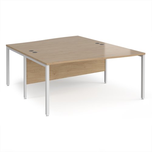 Maestro 25 back to back wave desks 1600mm deep - white bench leg frame, Kendal Oak top
