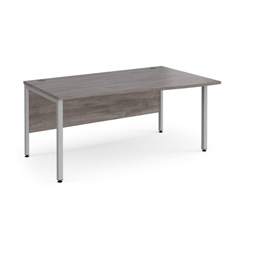 Maestro 25 Right Hand Wave Desk 1600mm Wide Silver Bench Leg Frame Grey Oak Top