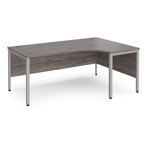 Maestro 25 right hand ergonomic desk 1800mm wide - silver bench leg frame, grey oak top