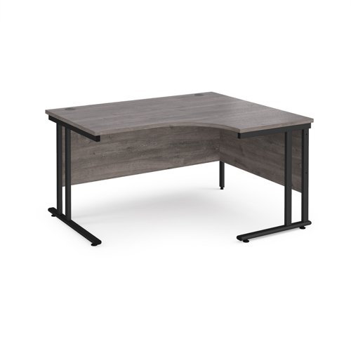 Maestro 25 right hand ergonomic desk 1400mm wide - black cantilever leg frame, grey oak top