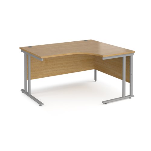 Maestro 25 right hand ergonomic desk 1400mm wide - silver cantilever leg frame, oak top MC14ERSO Buy online at Office 5Star or contact us Tel 01594 810081 for assistance