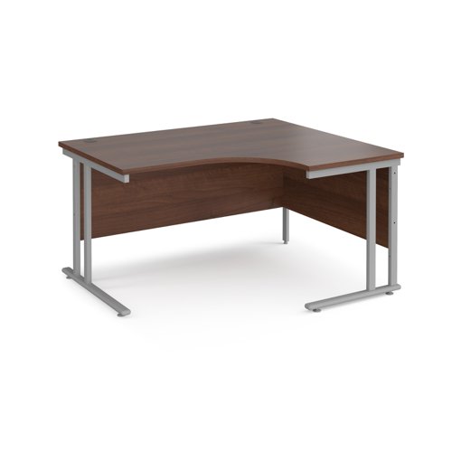 Maestro 25 right hand ergonomic desk 1400mm wide - silver cantilever leg frame, walnut top MC14ERSW Buy online at Office 5Star or contact us Tel 01594 810081 for assistance