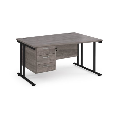 Maestro 25 right hand wave desk 1400mm wide with 3 drawer pedestal - black cantilever leg frame, grey oak top