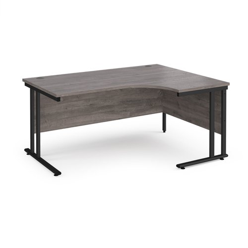 Maestro 25 right hand ergonomic desk 1600mm wide - black cantilever leg frame, grey oak top