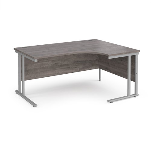 Maestro 25 right hand ergonomic desk 1600mm wide - silver cantilever leg frame, grey oak top