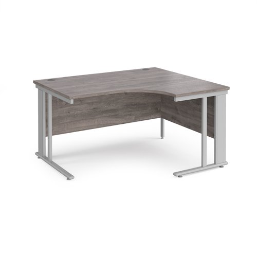 Maestro 25 right hand ergonomic desk 1400mm wide - silver cable managed leg frame, grey oak top