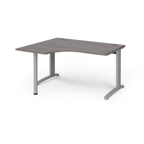 TR10 left hand ergonomic desk 1400mm - silver frame, grey oak top TBEL14SGO Buy online at Office 5Star or contact us Tel 01594 810081 for assistance