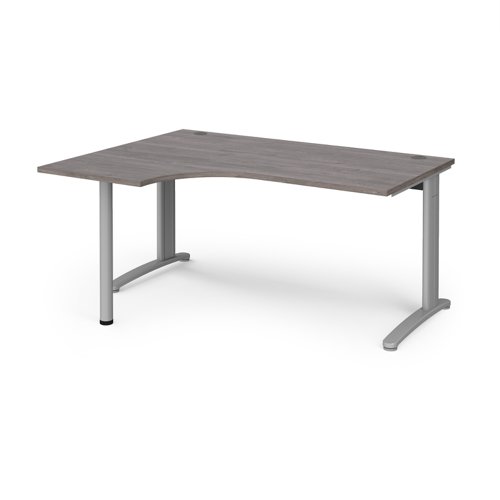 TR10 left hand ergonomic desk 1600mm - silver frame, grey oak top TBEL16SGO Buy online at Office 5Star or contact us Tel 01594 810081 for assistance