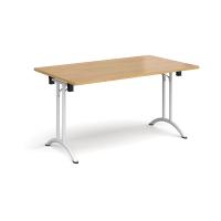 Rectangular folding leg table with white legs and curved foot rails 1400mm x 800mm - oak