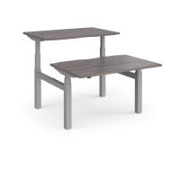 Elev8 Touch sit-stand back-to-back desks 1200mm x 1650mm - silver frame, grey oak top