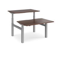 Elev8 Touch sit-stand back-to-back desks 1200mm x 1650mm - silver frame, walnut top