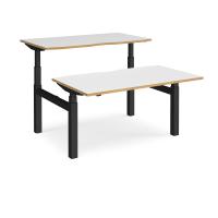 Elev8 Touch sit-stand back-to-back desks 1400mm x 1650mm - black frame, white top with oak edge