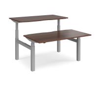 Elev8 Touch sit-stand back-to-back desks 1400mm x 1650mm - silver frame, walnut top