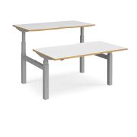 Elev8 Touch sit-stand back-to-back desks 1400mm x 1650mm - silver frame, white top with oak edge