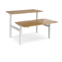 Elev8 Touch sit-stand back-to-back desks 1400mm x 1650mm - white frame, oak top