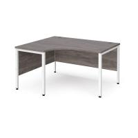 Maestro 25 left hand ergonomic desk 1400mm wide - white bench leg frame, grey oak top