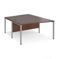 Maestro 25 back to back wave desks 1400mm deep - silver bench leg frame, walnut top