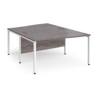 Maestro 25 back to back wave desks 1400mm deep - white bench leg frame, grey oak top