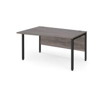 Maestro 25 left hand wave desk 1400mm wide - black bench leg frame, grey oak top