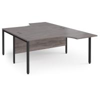 Maestro 25 back to back ergonomic desks 1600mm deep - black bench leg frame, grey oak top
