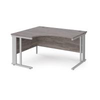 Maestro 25 left hand ergonomic desk 1400mm wide - silver cable managed leg frame, grey oak top