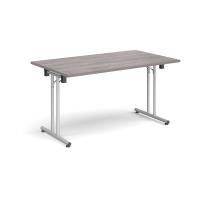 Rectangular folding leg table with silver legs and straight foot rails 1400mm x 800mm - grey oak