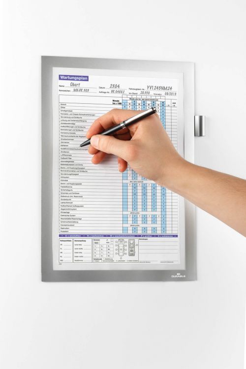The magnetic info frame DURAFRAME® Note with pen holder is the ideal solution for writing directly on documents and notices. The inserts can be quickly exchanged simply by lifting the magnetic frame away from the surface. The inserts can be directly written onto making it perfect for working procedures such as safety and maintenance checks etc.