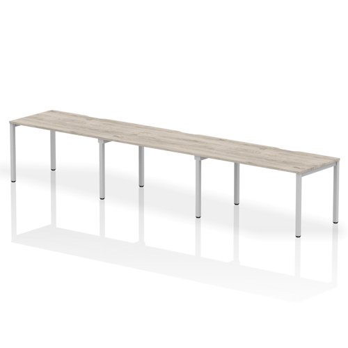 Evolve Plus 1400mm Single Row 3 Person Office Bench Desk Grey Oak Top Silver Frame