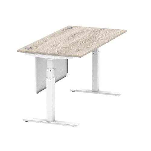 Air Modesty 1600 x 800mm Height Adjustable Office Desk Grey Oak Top Cable Ports White Leg With White Steel Modesty Panel