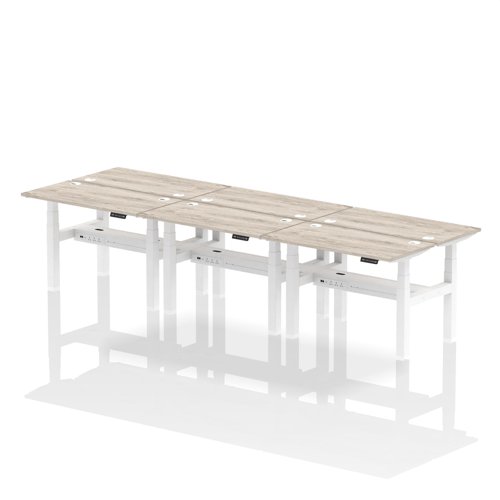 Air Back-to-Back 1200 x 600mm Height Adjustable 6 Person Bench Desk Grey Oak Top with Cable Ports White Frame