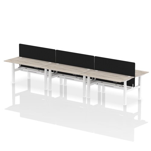 HA02447 | Elevate your office with the Air Back-to-Back Height Adjustable Desk for six, a blend of ergonomics and connectivity. Each desk includes two Ethernet ports, a USB and USB-C port, and three UK plugs, complemented by integrated cable ports for a clean setup. The addition of a dividing screen per duo offers privacy and focus. This desk is a perfect match for professionals seeking a tidy, tech-friendly, and adaptable workspace.