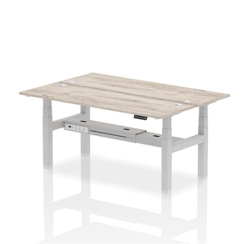 Air Back-to-Back 1800 x 600mm Height Adjustable 2 Person Bench Desk Grey Oak Top with Cable Ports Silver Frame