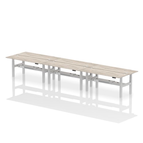 Air Back-to-Back 1800 x 600mm Height Adjustable 6 Person Office Bench Desk Grey Oak Top with Cable Ports Silver Frame